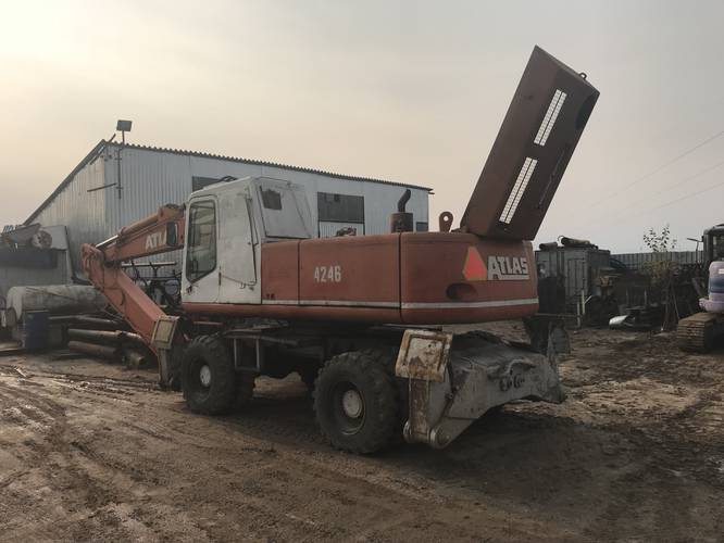 колесный экскаватор atlas 1704