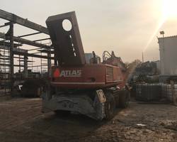 колесный экскаватор atlas 1704